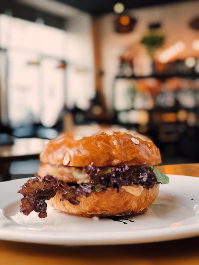 Selective Focus Photography Of Burger On White Ceramic Plate 908849