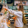 Woman In White Long Sleeve Jacket Shopping For Fruits 3962291