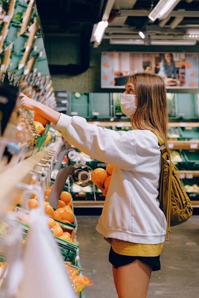 Woman In White Long Sleeve Jacket Shopping For Fruits 3962291