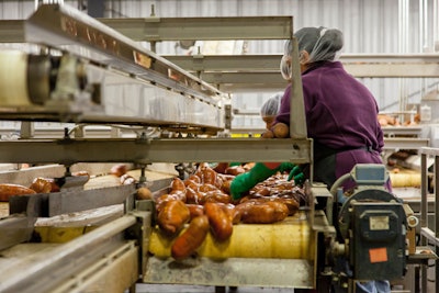 Woman Cleaning Sweet Potatoes 2889093