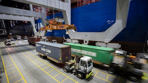 Crews work the COSCO Rose at the Port of Savannah's Garden City Terminal