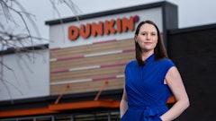 Liz Longstreet Darr stands outside of Dunkin', which National DCP serves.