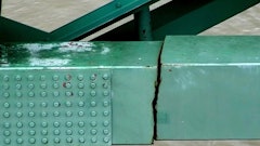 Traffic on the six-lane bridge was shut down May 11 after inspectors found a “significant fracture” in one of two 900-foot horizontal steel beams that are critical for the bridge’s integrity.