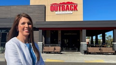 Lindy Miller, senior director, quality assurance for Bloomin Brands, stands outside an Outback Steakhouse in Tampa, Fla.