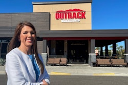 Lindy Miller, senior director, quality assurance for Bloomin Brands, stands outside an Outback Steakhouse in Tampa, Fla.
