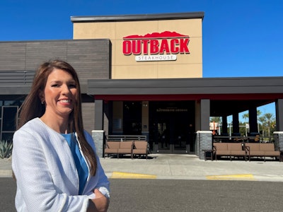Lindy Miller, senior director, quality assurance for Bloomin Brands, stands outside an Outback Steakhouse in Tampa, Fla.