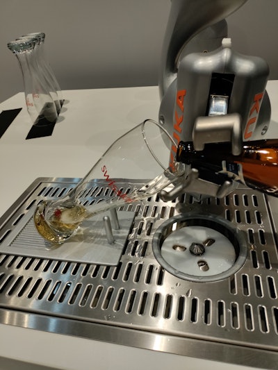 On display at the Swisslog booth was a robotic beer pourer.