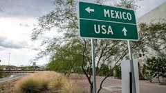Mexico-U.S. border indication sign.