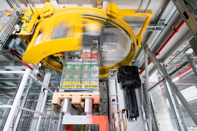 Dematic mixed case palletizer in action.
