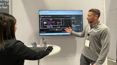 Editor-in-Chief Marina Mayer (left) demos the Yale Relay live at ProMat 2025, with instruction from Kyle Smart, sales manager, emerging technology, Yale Lift Truck Technologies.