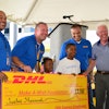 (left to right): Cain Moodie, DHL Express, Travis Cobb, DHL Americas Hubs, Gateways, Network Control, Sierra of Make-a-Wish, Daniel of Make-a-Wish, Mike Parra, DHL Express and David Mann, Make-A-Wish board member.
