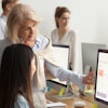 Stock Meeting In Front Of Computer