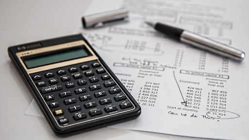 Black Calculator Near Ballpoint Pen On White Printed Paper 53621