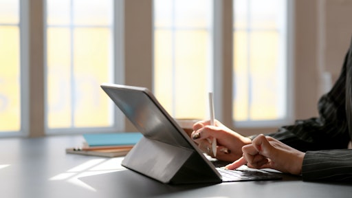 Person Using Tablet Computer With Keyboard 3815615