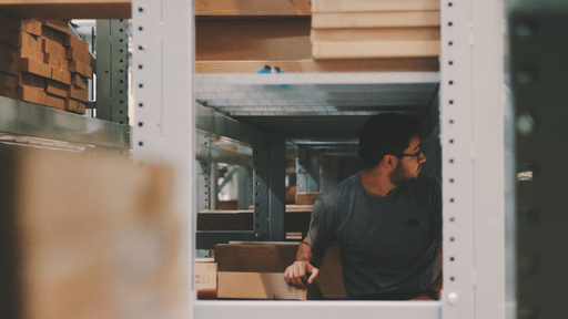 Stock Man In Warehouse