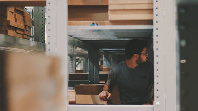 Stock Man In Warehouse