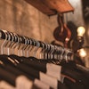 Photo Of Black Clothes On Hangers 1036856