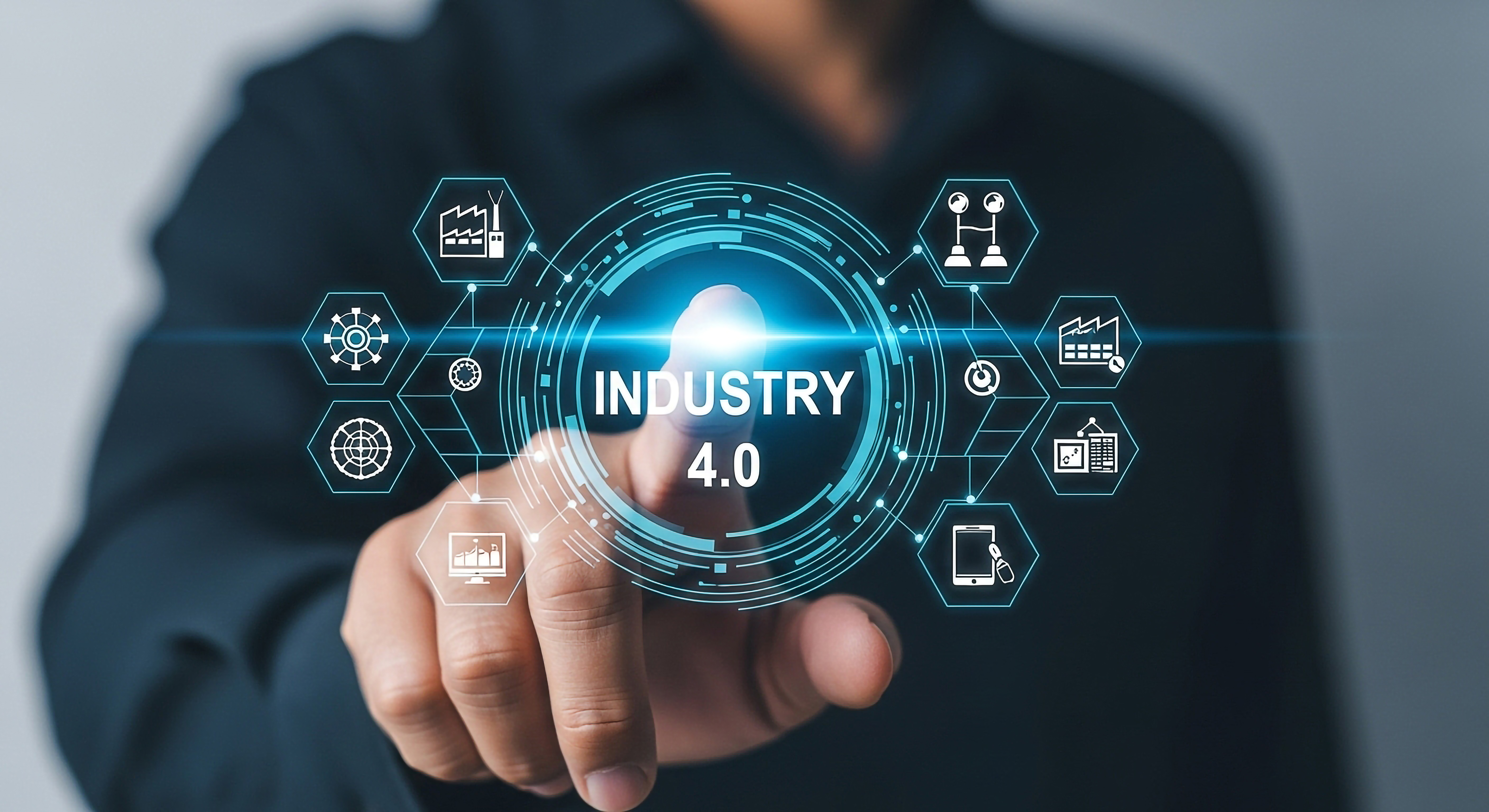 Professional holding holographic Industry 4.0 interface with connected technology icons