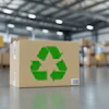 Cardboard box with green recycling symbol in warehouse storage facility