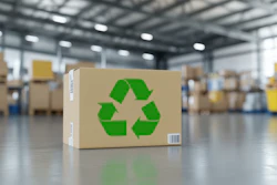 Cardboard box with green recycling symbol in warehouse storage facility