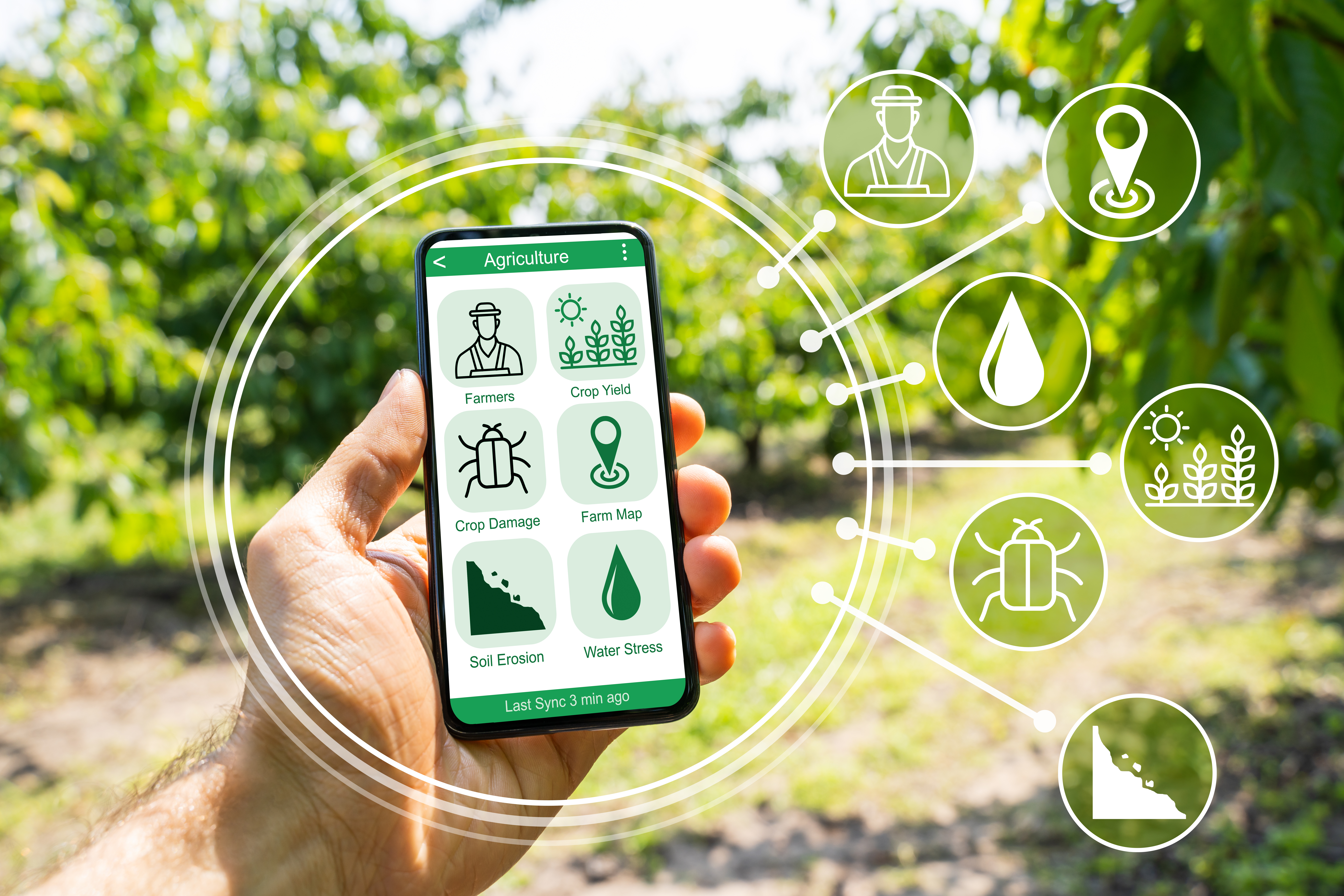 Hand holding smartphone displaying agriculture app with farming icons and crop management tools in field setting