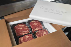 Puratherm insulated shipping box containing premium beef steaks in black trays