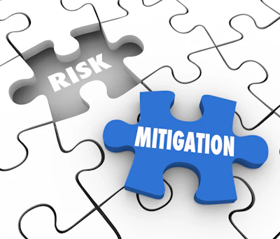 Puzzle pieces illustrating risk and mitigation concepts, with gray risk piece and blue mitigation piece