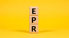 Three wooden letter tiles stacked vertically spelling EPR on yellow background
