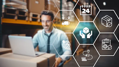 Man working on laptop in warehouse with supply chain logistics icons representing delivery, tracking, and quality management