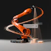 KUKA industrial robotic arm performing dynamic welding motion with sparks and light effects against dark background