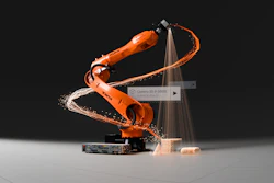 KUKA industrial robotic arm performing dynamic welding motion with sparks and light effects against dark background