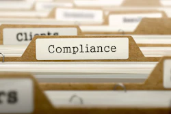 Compliance folder tab in organized file system with other labeled documents